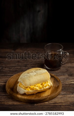 Bread with egg. Bread filled with scrambled eggs, known in Brazil as "Pão com ovo".