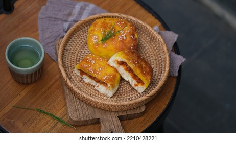 Bread Floss On A Rattan Plate On A Round Table.