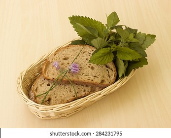bread and herbs on the table