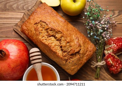 Bread With Honey And Fruits On Wooden Background. Rosh Hashanah (Jewish New Year) Celebration