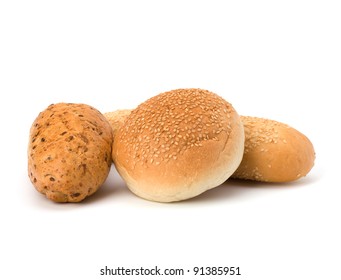 Bread loafs and buns variety isolated on white background