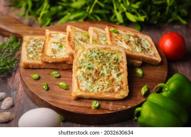 Bread Omelette On A Wooden Plate Bowl With Selective Focus And Blur