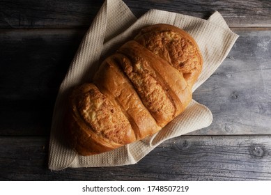 
bread on gray background on beige cloth - Shutterstock ID 1748507219