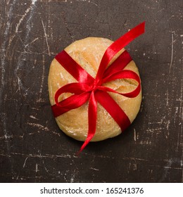 bread with red ribbon