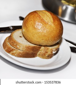 Bread Roll And Slices In A Plate
