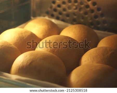 bread rolls baking in convection oven