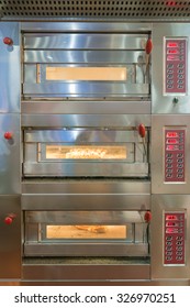 Bread Rolls Baking In Oven In A Commercial Kitchen 