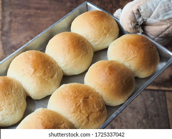 Bread rolls in baking tray.