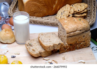 bread and rolls in wicker basket - Shutterstock ID 266079992