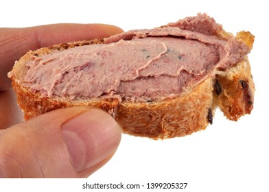 A Bread Sandwich With A Bread Sandwich With Liver Pâté In Hand In Hand