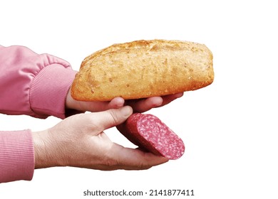 Bread And Sausage In The Hand Of A Middle-aged Woman. The Concept Of The World Food Crisis Associated With The War In Ukraine. Isolated On White Background.