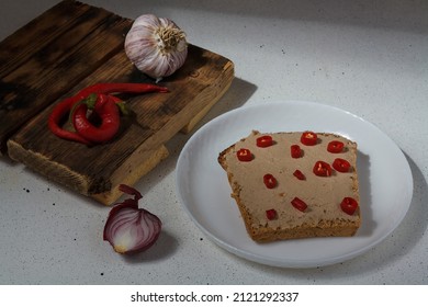 Bread Slice With Beef Or Pork Meat Spread, Pate, Paste, Home Made Pasty With Red Pepper, Onions, Garlic On Wooden Board. Tasty Lunch