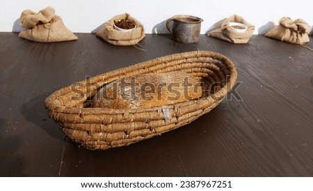 Bread in a straw basket, castle kitchen.