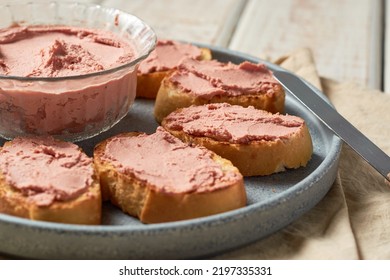 Bread Toast With Pork Liver Pâté On A Rustic Background.