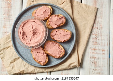 Bread Toast With Pork Liver Pâté On A Rustic Background.