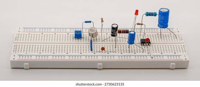 Breadboard electrical circuit with components. 