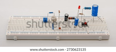 Breadboard electrical circuit with components. 