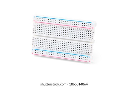 Breadboard isolated on white with shadows. Item for mounting electronic components without soldering. With red and blue stripes, numbered for easy DIY IC assembly.
