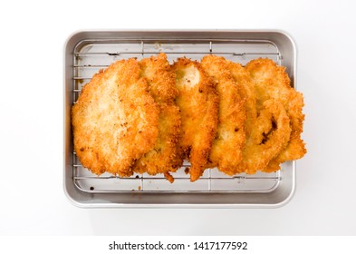 Breaded Chicken Strips On Aluminum Tray On White Background.Chicken Tender Cutlet. 