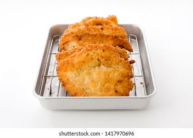 Breaded Chicken Strips On Aluminum Tray On White Background.Chicken Tender Cutlet. 