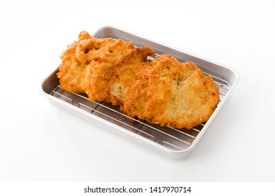 Breaded Chicken Strips On Aluminum Tray On White Background.Chicken Tender Cutlet. 