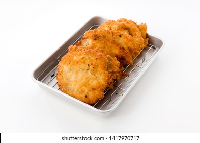 Breaded Chicken Strips On Aluminum Tray On White Background.Chicken Tender Cutlet. 