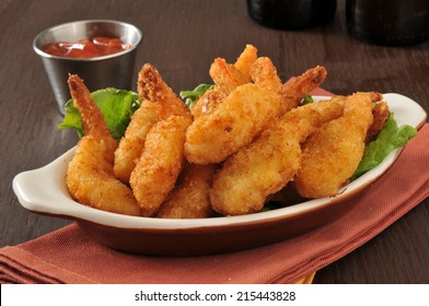 Breaded Deep Fried Butterfly Shrimp With Cocktail Sauce And Beer