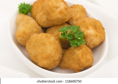 Breaded Deep Fried Mushrooms Garnished With Parsley. Party Food Table Set Up Shot From Above.