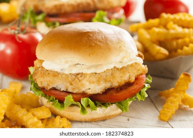 Breaded Fish Sandwich With Tartar Sauce And Fries