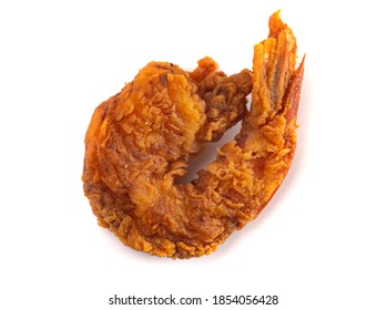 Breaded And Fried Jumbo Shrimp With Tails Isolated On A White Background