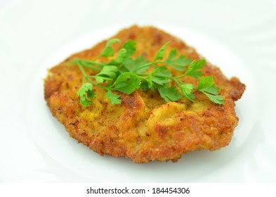 Breaded Pork Chop On A Plate 