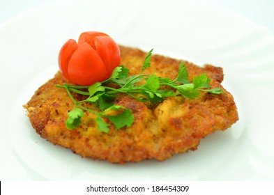 Breaded Pork Chop On A Plate 