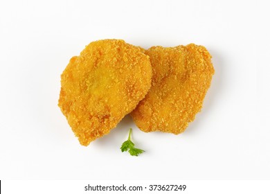 Breaded Turkey Breasts On White Background