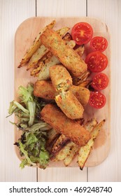 Breaded Veggie Sticks With Roasted Potato And Salad