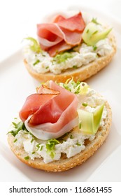 Breadroll with cream cheese and smoked bacon