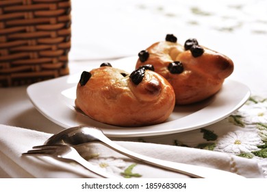 Breads served on a plate with fork and spoon