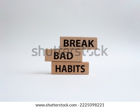 Break bad habits symbol. Concept words Break bad habits on wooden blocks. Beautiful white background. Medicine and Break bad habits concept. Copy space.