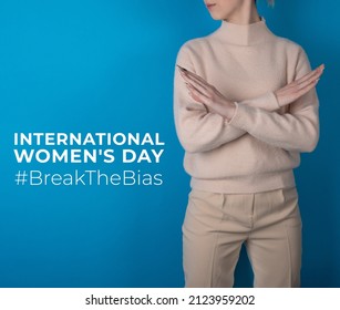Break the bias symbol of woman's international day. Crossed hands. Woman arms crossed to show solidarity, breaking stereotypes, inequality  - Shutterstock ID 2123959202