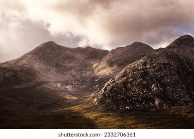 A break in the clouds shining on the highlands of Scotland. - Powered by Shutterstock