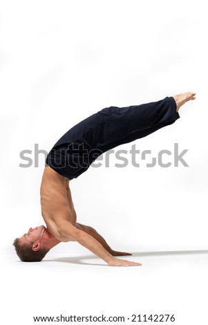 Similar – Mexican yoga teacher practicing side angle pose