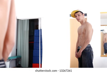 Break Dancer Looking His Body In Mirror