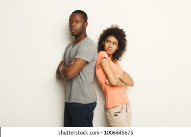 Break Up Or Divorce. Upset Young African-american Couple Standing Back To Back After Quarrel, Isolated White Background, Family Misunderstanding Concept, Copy Space