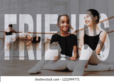 Break During Ballet Class. Mixed Race And Caucasian Kids Smile And Talk. Children In Ballet Wear At Professional Dance Class. Kids Sit On A Floor. Friends At The Dance Studio. Transparent Text.
