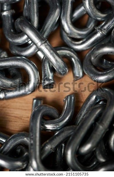 Break free from the chains of life. Shot of metal\
chains with a broken\
link.