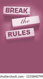 Break The Rules Phrase On Wooden Blocks On Dark Grey. Behavior Concept Or Innovative Business Management Concept