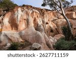 The "Breakaways" in Western Australia are rock formations, mesas, that are characterized by steep, often colorful, slopes. Composed of a type of soil that