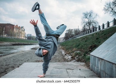 Breakdance Performer, Upside Down Motion On Street