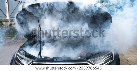 Breakdown car full with smoke from open hooded 