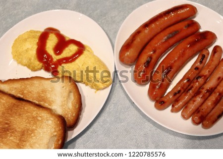 Breakfast for 2 people cooked by a beginner
Bread and omelette and sausage