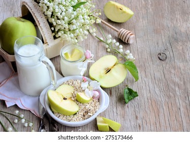 breakfast with an apple, cereal and milk - Powered by Shutterstock